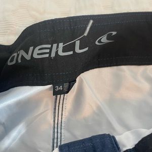 O’Neill Men’s 34 swim trunks. Never worn. Partial tag still on